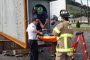 Volunteer and High Steel Structures co-worker Shannon Givler is rescued from a 70-ton box girder in a simulation of an explosion in a confined space.